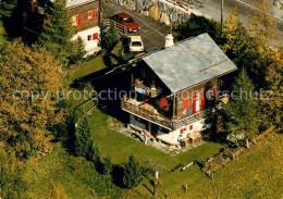 13237448 Leukerbad Chalet Briand Und Mazot Fliegeraufnahme Leukerbad - Autres & Non Classés