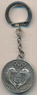 Porte Clefs Métallique Des X° Jeux Olympiques D'Hiver De Grenoble 1968  Olympic Games 68 Dauphins Trois Roses - Porte-clefs