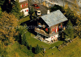 13224212 Leukerbad Chalet Briand Und Mazot Fliegeraufnahme Leukerbad - Autres & Non Classés