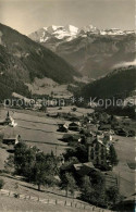 13190671 Kiental Dorf Und Kapelle Mit Bluemlisalp Kiental - Autres & Non Classés