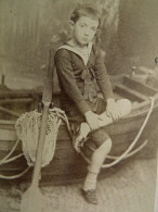 Photo CDV Carette à Valenciennes  Jeune Garçon (Henri Portier)  Assis Sur Une Barque  Décor Studio CA 1880 - L679A - Anciennes (Av. 1900)