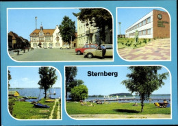 CPA Sternberg In Mecklenburg, Karl Liebknecht Platz, Kreiskulturhaus Benno Voelkner, See, Freibad - Andere & Zonder Classificatie