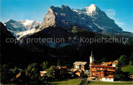 12862498 Grindelwald Teilansicht Mit Kirche Fiescherhoerner Eiger Berner Alpen G - Altri & Non Classificati