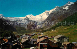 12853914 Saas-Fee Ortsansicht Mit Blick Zum Alphubel Und Taeschhorn Walliser Alp - Other & Unclassified