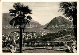 12705334 Lugano TI Panorama Lago Monte San Salvatore Luganersee Palmen Lugano - Autres & Non Classés