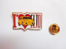 Beau Pin's , Auto Renault Clio Jaune , Dimensions : 18X28 Mm , Non Signé - Renault