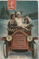 HO 22 - CARTE  " BONNE ANNEE " - AUTOMOBILE A MANIVELLE AVEC CALANDRE DOREE - ENFANTS AVEC FER A CHEVAL- 2 SCANS  - Neujahr