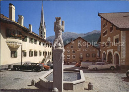 12603600 Zuoz GR Dorfplatz Mit Kirche Brunnen Zuoz - Autres & Non Classés