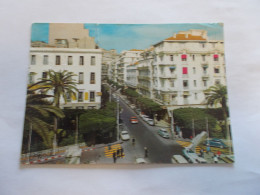 ALGER ( ALGERIE ) RUE BEN M'HEDI LARBI PLACE EMIR ABDELKADER  ANIMEES VIEILLES AUTOS VUE COLORISER - Algerien