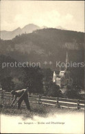 12586498 Lungern Kirche Und Oltschiberge Bergbauer Lungern - Altri & Non Classificati