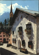 12508502 Scuol Tarasp Vulpera Dorfgasse In Scuol Kirchturm Alpines Heilbad Alpen - Autres & Non Classés