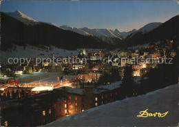 12468143 Davos GR Dorfansicht Am Abend Alpenpanorama Davos Platz - Autres & Non Classés