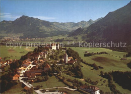 12378388 Gruyeres FR Et Son Chateau Vue Aerienne Gruyeres - Autres & Non Classés