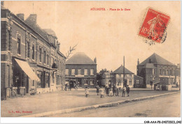 CAR-AAAP8-59-0553 - AULNOYE - La Place De La Gare - Commerces - Aulnoye