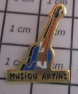 3417 Pin's Pins / Beau Et Rare / MUSIQUE / VIOLON CONTREBASSE ? MUSIQU'ARTINS - Musik