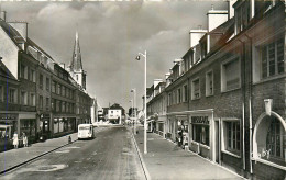 50* PERIERS  La Rue St Lo   CPSM (9x14cm)        RL37.0364 - Autres & Non Classés