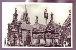 29 - GUIMILAU - LE CALVAIRE ET L'ÉGLISE -  - Guimiliau