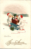 Pauli Ebner Bonne Année Enfant Child Bambino Luge Cadeau Sled Gift A.G./B. ?? Cpa Couleur Ecrite Au Dos En 1936 TB.Etat - Ebner, Pauli