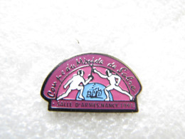 PIN'S    SPORT  ESCRIME    COUPE DU MONDE DE SABRE  NANCY  1991 - Esgrima