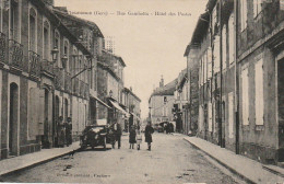 YO 12-(32) FLEURANCE - RUE GAMBETTA - HOTEL DES POSTES - ANIMATION - AUTOMOBILE - PHOT. EDIT. BACON , FLEURANCE - Fleurance