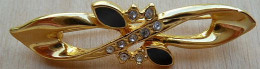 Broc-091 Broche Métal Doré De 45mm/8mm Sertie De Brillants Et De 2 Pièrres Noires - Brooches