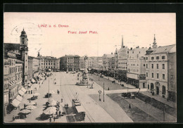 AK Linz A. D. Donau, Franz Josef Platz Mit Geschäften Und Denkmal, Strassenbahn  - Strassenbahnen