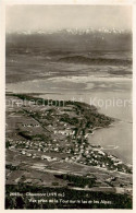 13816225 Chaumont NE Vue Prise Aerienne De La Tour Sur Le Lac Et Les Alpes  Chau - Autres & Non Classés