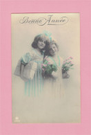 XB1297  JEUNE FILLE, ENFANT, GIRL FAMOUS MODEL GRETE REINWALD & SISTER HANNI NEW YEAR GREETINGS RPPC - Retratos