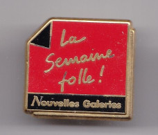 Pin's  La Semaine Folle Nouvelles Galeries Réf 7900JL - Other & Unclassified