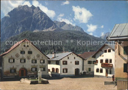 11888548 Scuol Tarasp Vulpera Dorfplatz In Scuol Brunnen Piz Pisoc Scuol - Autres & Non Classés