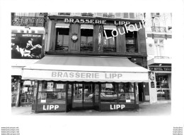 PARIS SAINT GERMAIN DES PRES BRASSERIE LIPP DECES DE ROGER CAZES 04/1987 PHOTO  DE PRESSE AGENCE  ANGELI 29X21CM REF3 - Orte