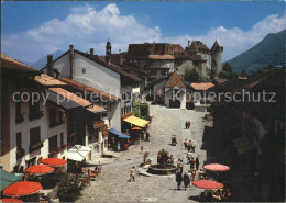 11877201 Gruyeres FR Dorfpartie Mit Brunnen Gruyeres - Sonstige & Ohne Zuordnung