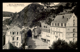 63 - LA BOURBOULE - LE PUITS CHOUSSY ET LE ROCHER - La Bourboule