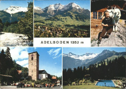 11871554 Adelboden Kirche Schwimmbad Kind Ziege Ortsansicht Adelboden BE - Autres & Non Classés