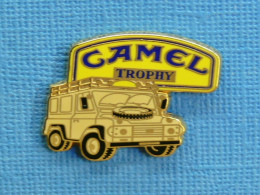 1 PIN'S /  ** RALLYE RAID " CAMEL TROPHY " 4X4 LAND ROVER ** . (A.B. Paris) - Rally