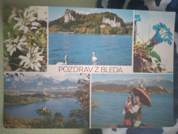 Bled. Carnolian Costtume. Flowers Planika. Church. Island. Castle. - Eslovenia