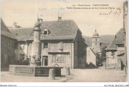 ALE2P8-68-0150 - Haute-alsace - SAINT-AMARIN - Vieille Fontaine Surmontée Du Cop Gaulois Et L'église  - Saint Amarin