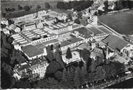 CPSM. 25 PONTARLIER. VUE AERIENNE DE L'USINE NESTLE ET KOHLER. - Pontarlier