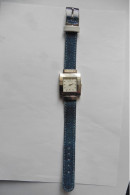 Montre Femme Réversible Steltman Métal Argenté Tissu Jean Bleu Et Cuir Blanc - Moderne Uhren