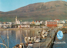 73626350 Husavik Harbour Scene And Town Centre Husavik  - Islande