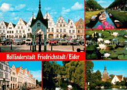 73622394 Friedrichstadt Eider Marktplatz Kanal Seerosenteich Haeuserzeile Kirche - Autres & Non Classés