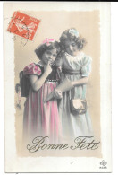 CPA  ENFANT  .ARTISTIQUE   LES SOEURS REINWALD  ESPIEGLE TBE.1911  BONNE FETE - Portraits