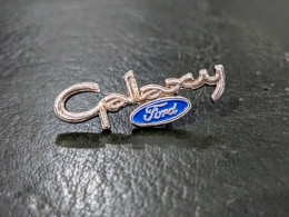 A Pins Pin's Ford Galaxy Logo Car Badge Automobile Lapel Enamel Pin Voiture Taille : 30 * 11 Mm Bon Etat Envois Soigne E - Ford