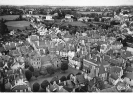 15 MAURIAC AA#DC026 VUE AERIENNE PLACE DE L EGLISE ET SES ALENTOURS BOISES - Mauriac