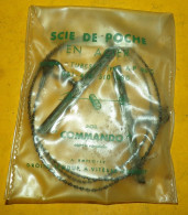 SCIE DE POCHE EN ACIER MODELE COMMANDO , MARQUE TUBEST TYPE A.P 88  C , ETAT NEUF SOUS EMBALLAGE , MODELE A POIGNEE A DE - Equipaggiamento