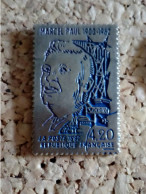 Pin's Marcel Paul 1900-1982 La Poste 1992 Forme Timbre - Poste