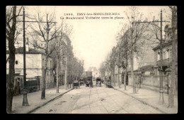 92 - ISSY-LES-MOULINEAUX - LE BOULEVARD VOLTAIRE VERS LA PLACE - Issy Les Moulineaux