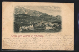 Cartolina Cortina D`Ampezzo, Ortsansicht Mit Kirche Gegen Gebirgsmassiv  - Sonstige & Ohne Zuordnung