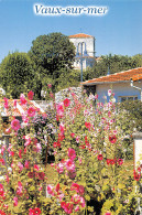 VAUX SUR MER  Clocher De L'église Romane Et Coin Fleuri De Roses Trémières  7 (scan Recto Verso)MG2854 - Other & Unclassified