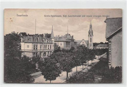 39097207 - Saarlouis. Kreis-Sparkasse Evangelische Kirche. Karte Beschrieben Leichte Abschuerfungen, Sonst Gut Erhalten - Autres & Non Classés